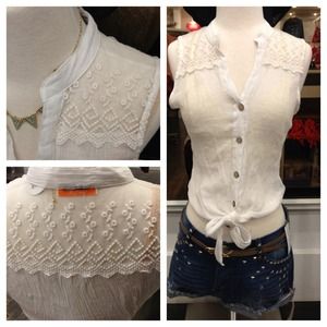 Sleeveless white sheer top