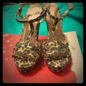 Colin Stuart T-strap leopard wedge heels.