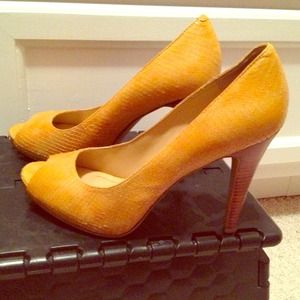 Nine West yellow pumps