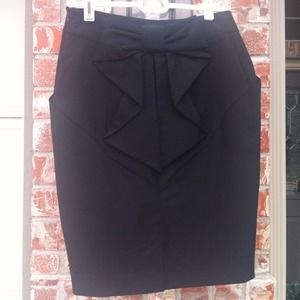 Black short skirt with bow on back & pockets!