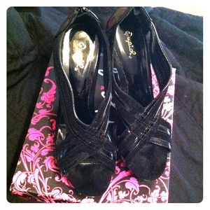 Cute Black strapped heels very good condition.