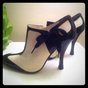 Yves Saint Laurent booties with bow detail!
