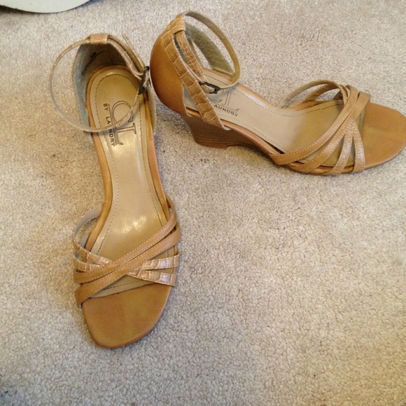 Apprx. 3 inch wedge heels. CL by laundry.