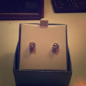 Never worn before silver diamond studs