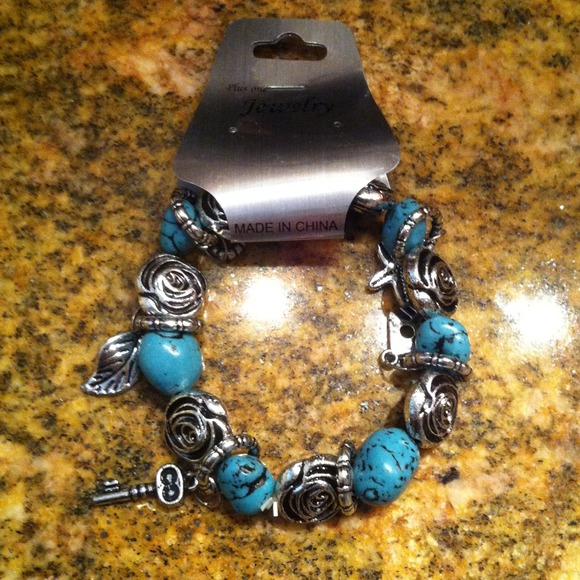 Jewelry - Turquoise bracket with charms