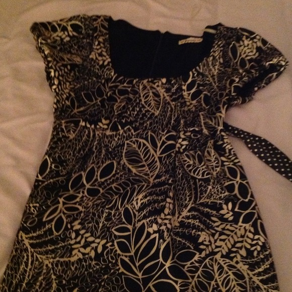 Cute black pattern dress with belt.