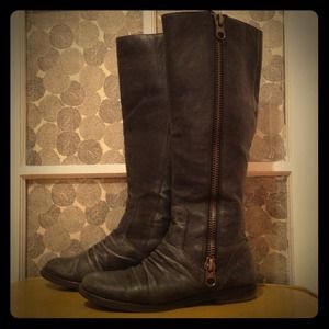 Tall black leather zipper boots