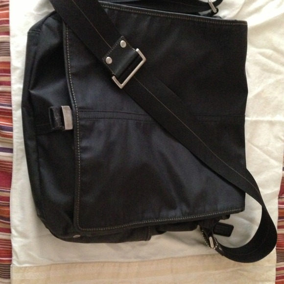 Black nylon Coach messenger bag.