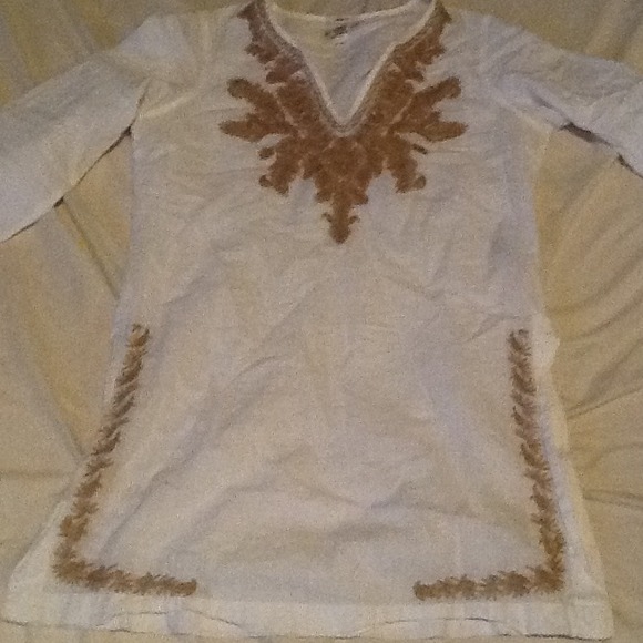 White and gold tunic