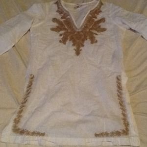 White and gold tunic