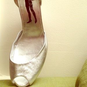 Silver peep toe Sigerson Morrison platform heels.