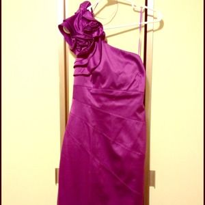 Purple, form-fitting, one shoulder dress