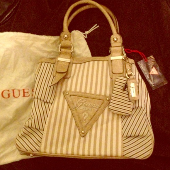 RESERVED-Brand New Guess Bag with tags!!