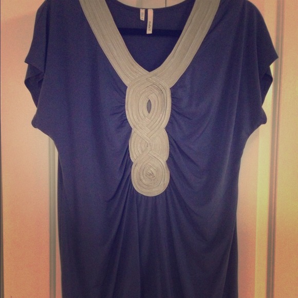 Traded****Purple and silver shirt