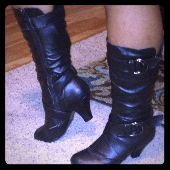 Black leather strappy boots