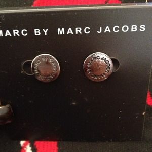 MARC JACOBS black disk pierced earrings.