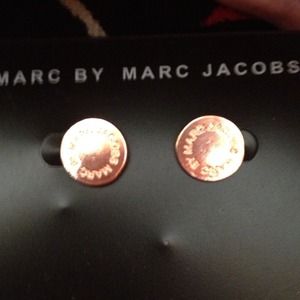 MARC JACOBS copper disk pierced earrings.