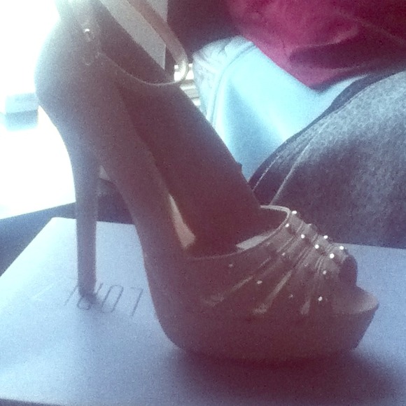 JLo pink pumps shoes