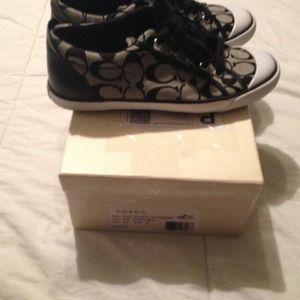 Black n white coach tennis shoes