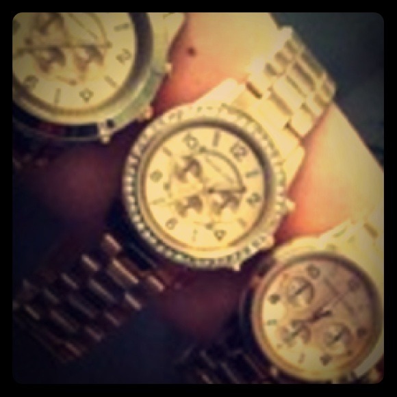 Michael Kors gold tone watch w/ rhinestones
