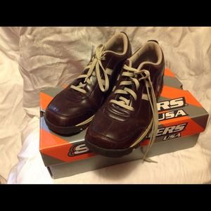 Brown sketchers shoes