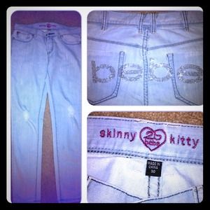 BEBE distressed skinny jeans