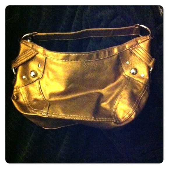 Small, gold hobo bag with sheen.