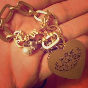 Juicy gold tone chunky charm bracelet