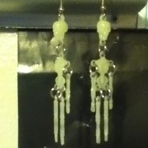 Glow in the dark skeleton earrings(: