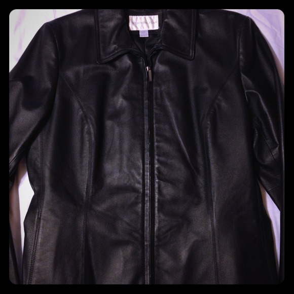 Black leather jacket and black and white dress