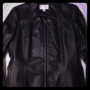 Black leather jacket and black and white dress