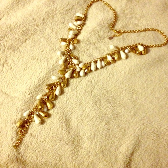 Cream and brass necklace