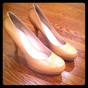 Nine west nude platform pumps