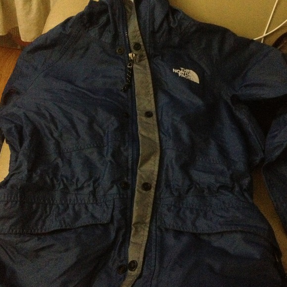 Blue Northface windbreaker jacket