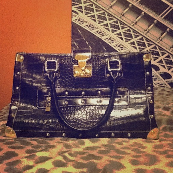 Spiked satchel