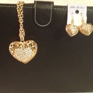 Diamond faux heart shaped pendant with earrings