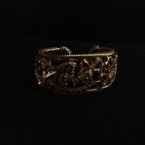 "Love" bracelet with hearts all around it reduced!