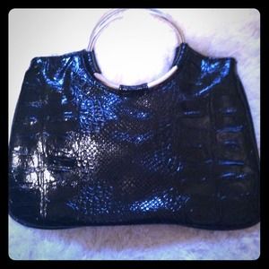 Black snakeskin clutch