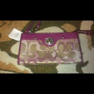 Authentic coach wristlet....never used
