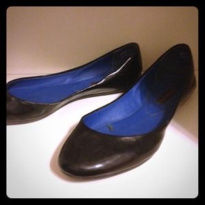 Shiny black flats