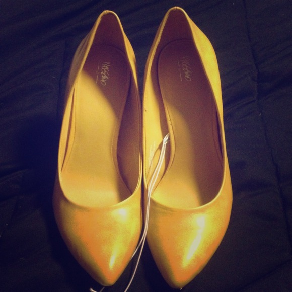 Yellow high heels