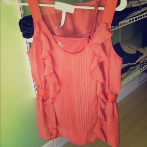 Coral ruffled dressy tank.