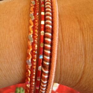 TRADED!! REDUCED AGAIN!!  5 Pcs Orange Bracelets