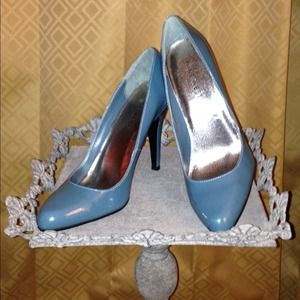 Teal blue Nine West pumps.