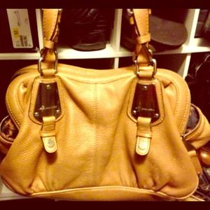B. Makowsky gold leathe purse