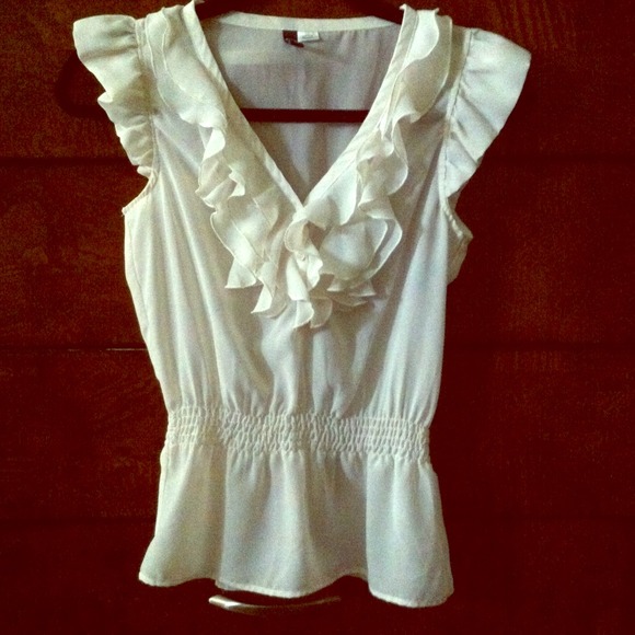 Cream ruffled blouse