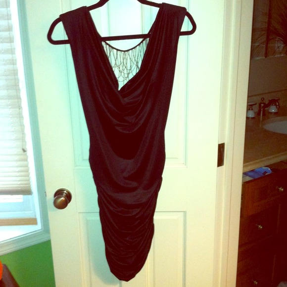 Black sexy dress, low cut decorative back