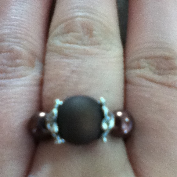  ON HOLDBrown stretch ring