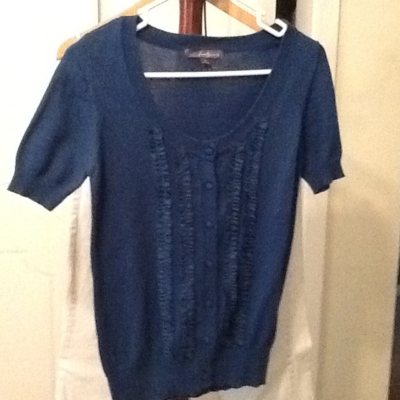 Blue sweater with darling detail on front!