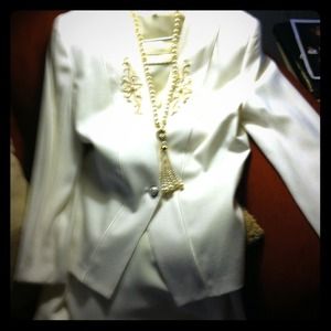 Two piece cream skirt suit never worn.+ necklace